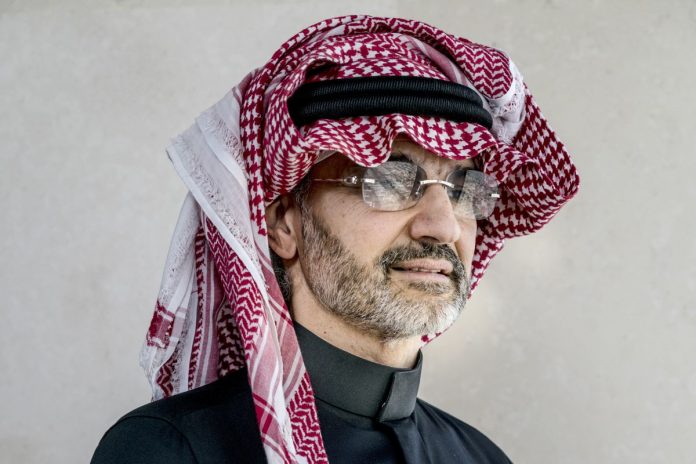 Prince Alwaleed Bin Talal, Saudi billionaire and founder of Kingdom Holding Co., poses for a photograph in the penthouse office of Kingdom Holding Co., following his release from 83 days of detention in the Ritz-Carlton hotel in Riyadh, Saudi Arabia