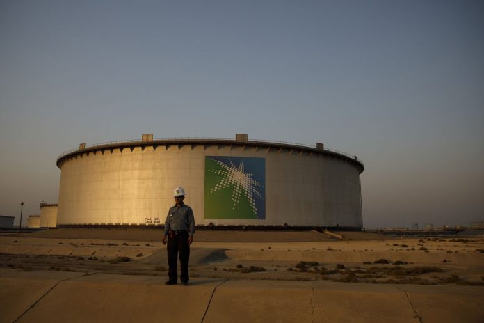 Saudi Aramco logo in saudi oilfield