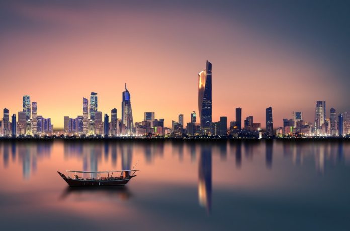 kuwait skyline; kuwait budget deficit lowered; kuwait CMA