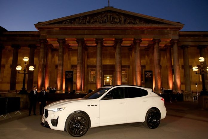 Maserati parked outside london's british museum at fashion for relief